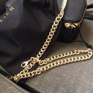 One gold Wristlet for bandolier phone case quantity: 1